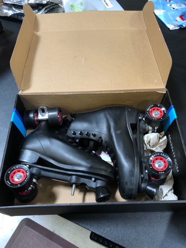 Photo 3 of Chicago Classic Men's Rink Skates
size  9 (major damage to wheels)