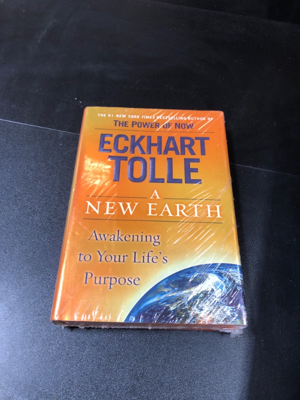 Photo 2 of A New Earth: Awakening to Your Life's Purpose Hardcover – October 11, 2005
