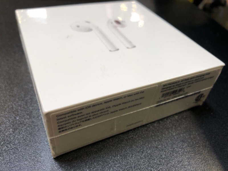 Photo 2 of Apple AirPods with Charging Case (Latest Model)