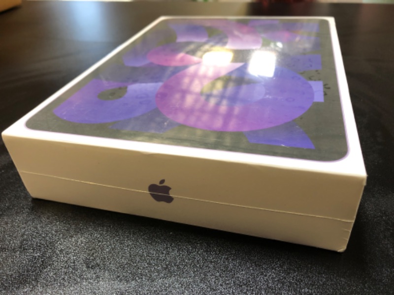 Photo 2 of Apple iPad Air (5th Generation): with M1 chip, 10.9-inch Liquid Retina Display, 64GB, Wi-Fi 6, 12MP front/12MP Back Camera, Touch ID, All-Day Battery Life – Purple WiFi Purple 64GB
