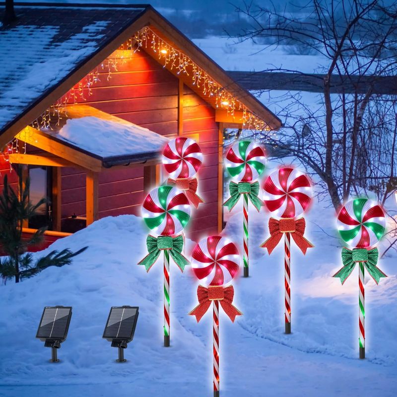 Photo 1 of Baquler 6 Pack 27.5" Lollipop Christmas Pathway Lights with Bows Outdoor Green Red White Solar Christmas Lights LED Christmas Decor with 8 Lighting Modes Candy Cane Lollipops Peppermint Stake Lights
