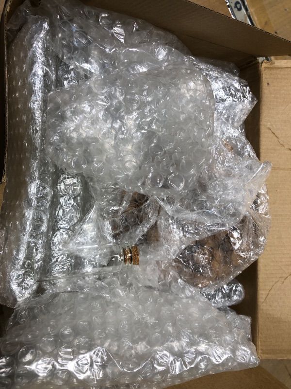 Photo 1 of 200 Pcs Empty Small Glass Bottles with Cork Stoppers Bulk Tiny Clear Vials Transparent Glass Vials Miniature Glass Jars with Cork Lids Cork Bottles for Crafts Project Party Supplies (15 ml)
