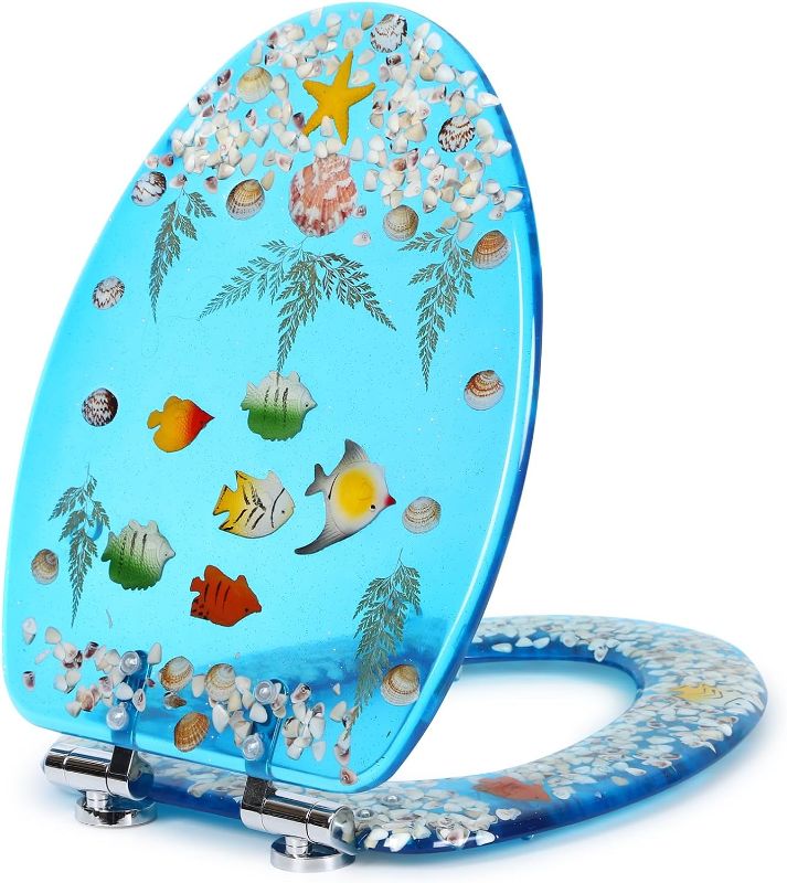 Photo 1 of Resin Toilet Seat, Round Soft Close Quick Release 3D Effects Heavy Duty Toilet Seats with Blue Fish Seashells Cover, Acrylic Seats Ocean Series 17 Inch