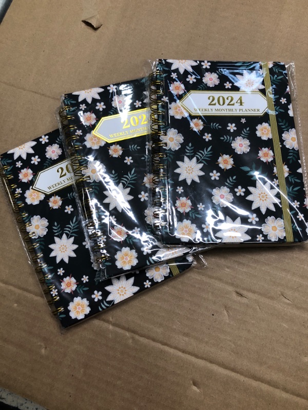 Photo 3 of (pack of 3) Ymumuda 2024 Planner, 12-Month Weekly Monthly Planner from JAN.2024 to DEC.2024, 8.4" X 6", Spiral Planner Notebook with Stickers, Elastic Closure, Inner Pocket, Coated Tabs, Floral 11 8.4"×6" F2024-11 (pack of 3)