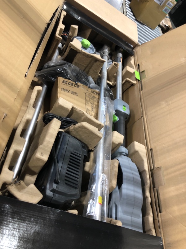 Photo 1 of ****MISSING BATTERY**** 
EGO Power+ MHC1502 Multi Combo Kit: 15 String Trimmer, 8-Inch Edger & Power Head with 5.0Ah Battery & Charger Included Attachment 3pc Multi Combo Kit