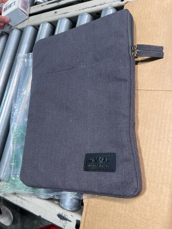 Photo 1 of kinmac grey laptop case 