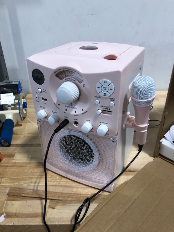 Photo 3 of **READ NOTES BEFORE PURCHASING ITEM** 
Singing Machine Portable Karaoke Machine for Adults & Kids with Wired Microphone, Rose Gold/Frosted Pink - Built-In Karaoke Speaker, Bluetooth with LED Disco Lights - Karaoke System with CD+G & USB