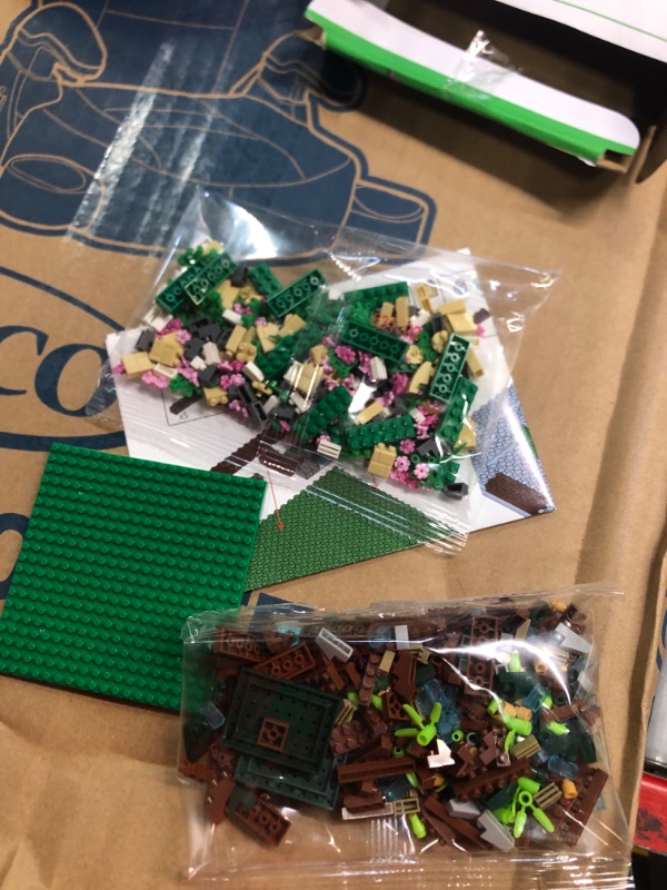 Photo 1 of COZYMASS Architecture River Windmill Building Model Kit Micro Block Set Mini Blocks 600+ PCS with 2 Figure Pink