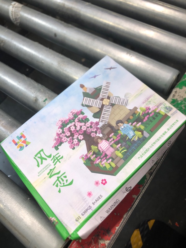 Photo 1 of COZYMASS Architecture River Windmill Building Model Kit Micro Block Set Mini Blocks 600+ PCS with 2 Figure Pink