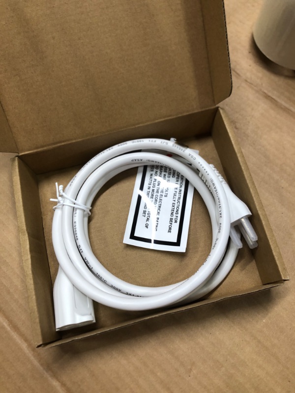 Photo 1 of Amazon Basics Extension Cord, 13 Amps, 125V, 6 Foot, White White 6-Foot Single Extension Cord