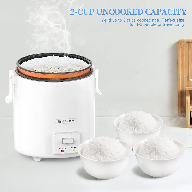 Photo 1 of 1.0L Mini Rice Cooker,WHITE TIGER Portable Travel Steamer Small,15 Minutes Fast Cooking, Removable Non-stick Pot, Keep Warm, Suitable For 1-2 People - For Cooking Soup, Rice, Stews & Oatmeal
 
