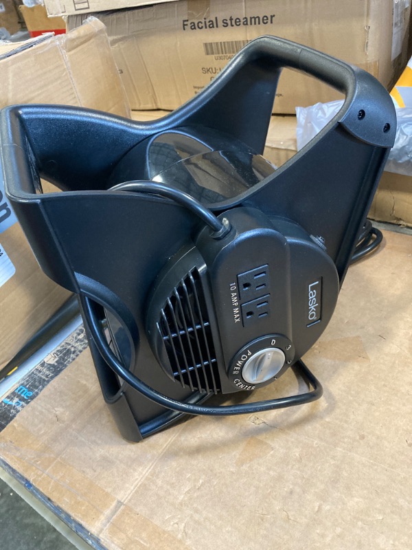 Photo 2 of Lasko 12” Utility Fan for Job Site or Home Use, 289 CFM, Pivoting High Velocity Blower Fans, 3 Speeds, 2 Accessory Outlets 120V, Black, U12104
