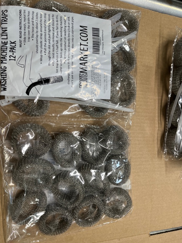 Photo 1 of 12 Pack of Washing Machine Lint Traps. Comes with 12 Ties. Attach to Your Washer Sink Hose and Allow the Metal Mesh Trap to Filter the Laundry Water. Stainless Steel and Rust Proof.