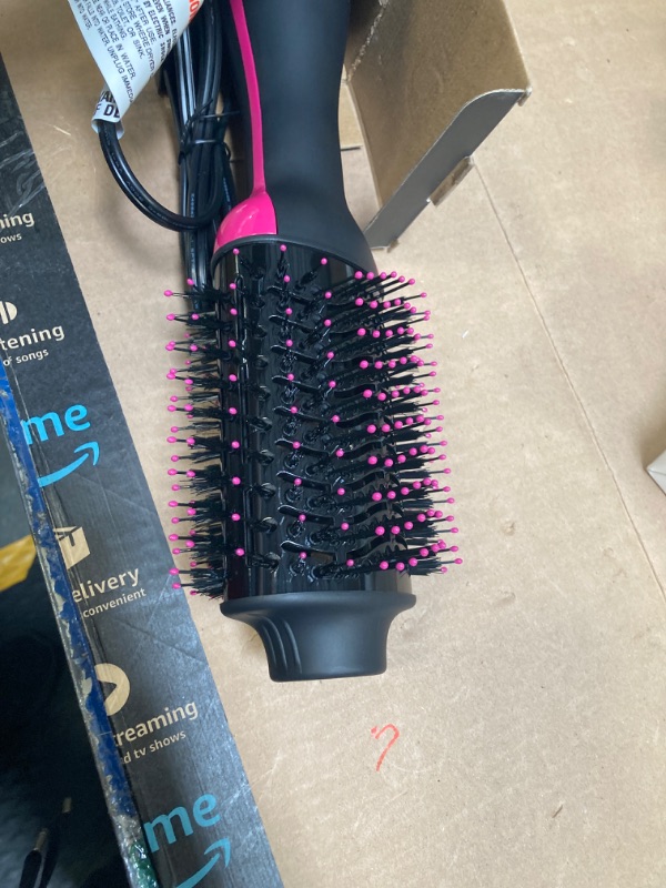 Photo 1 of  One-Step Volumizer Hair Dryer and Styler | Now with Improved Motor, Less Frizz, More Shine and Less Heat Damage for Salon-Style Blowouts | Amazon Exclusive (Black)
