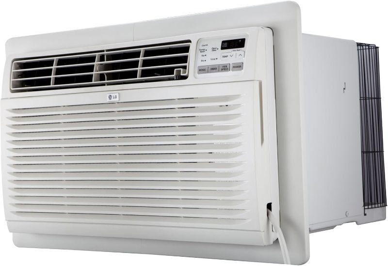 Photo 1 of ***HEAVILY USED***LG 11,800 BTU Through the Wall Air Conditioner, 230/208V, Cools up to 440 Sq. Ft. for Bedroom, Living Room, Apartment, with Remote, 3 Cool & Fan Speeds, Wall AC Unit, White
