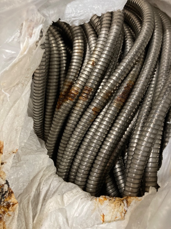 Photo 3 of ****USED** 100ft 304 Stainless Steel Garden Hose Metal, Heavy Duty Water Hoses with Nozzles for Yard, Outdoor - Flexible, Never Kink & Tangle, Puncture Resistant (Sliver) 100 ft