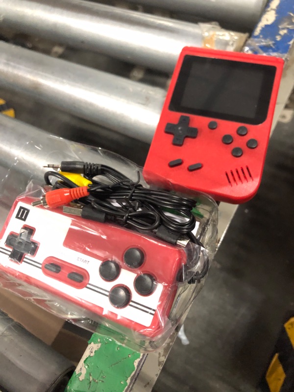 Photo 1 of Handheld Game Console-Portable Retro Video Game with 400 Classic FC Games, 2.8 Inch Color Screen, Support TV Connection & Two Players, 1020mAh Rechargeable Battery Present for Kids (RED)