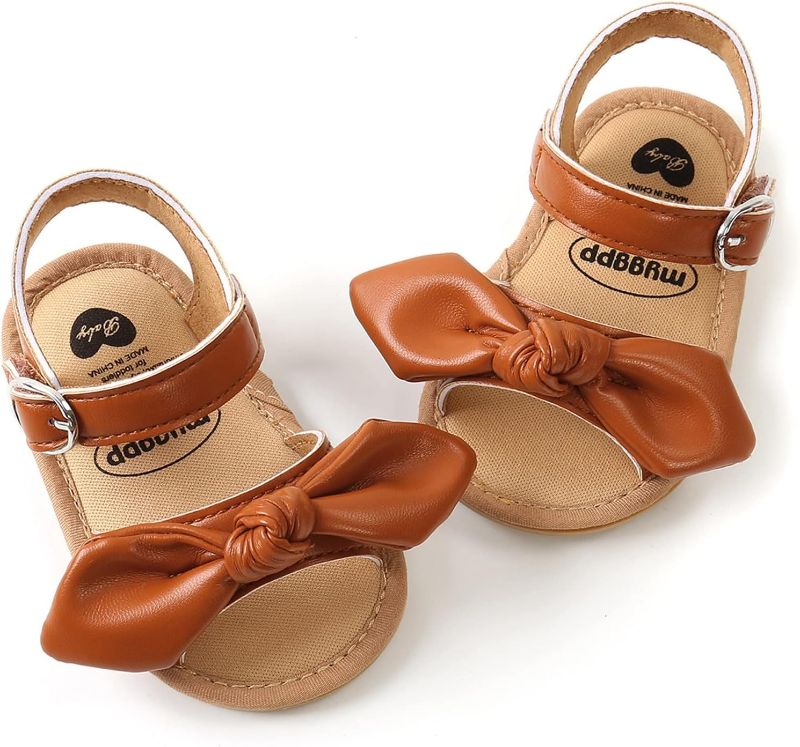 Photo 1 of Baby Girl Sandals Infant Soft Anti-Slip Rubber Sole Casual Beach Sandals Newborn Bowknot Outdoor First Walker Summer Shoes for Baby Girls Flat Sandal
