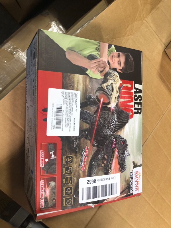 Photo 1 of FRUSE Remote Control Dinosaur Toys,Electric RC Spinosaurus w/Light Tracing & Spray Mist,Dinosaur Robot Toys Powered by Rechargeable Battery,Jurassic Dinosaur Toys for Boys Girls Kids Age 3 4 5 6 7 8 Spinosaurus Brown