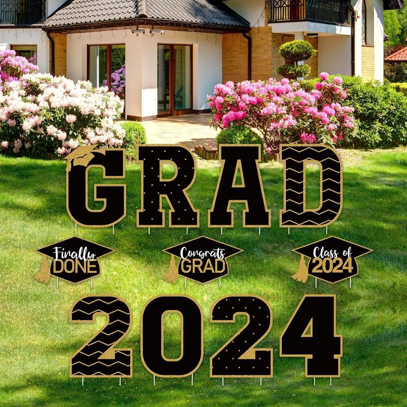 Photo 1 of 
Tatuo 11 Pcs Graduation Yard Sign Decorations Congrats Graduation Lawn Signs 2024 Grad Yard Signs with 23 Stakes for Outdoor Grad Party(Black and Gold,.