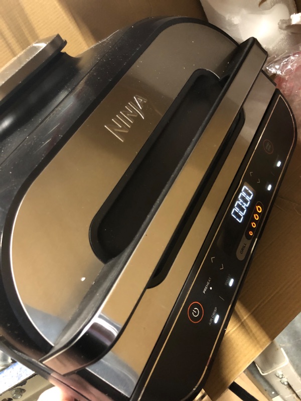 Photo 2 of *** MAJOR DAMAGED***
Ninja FG551 Foodi Smart XL 6-in-1 Indoor Grill with Air Fry, Roast, Bake, Broil & Dehydrate, Smart Thermometer, Black/Silver 1st Generation