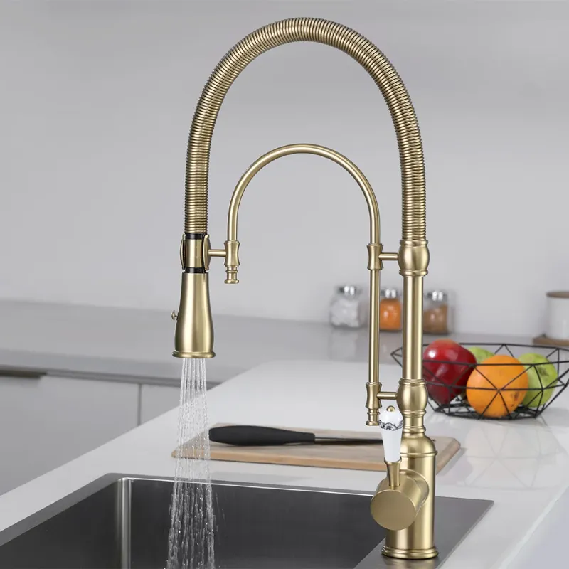 Photo 1 of Brushed Gold High Arc Dual-Mode Pull-Down Kitchen Faucet Solid Brass Porcelain Handle