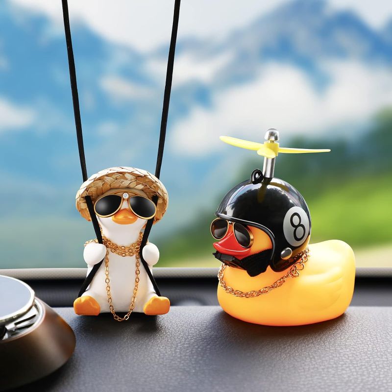 Photo 1 of 2 Pieces Swinging Duck Car Hanging Ornament Rubber Car Duck Car Ornament with Propeller Helmet Swing Duck Car Rear View Mirror Pendant Yellow Duck Car Dashboard for Car Decor(Cool Style)
