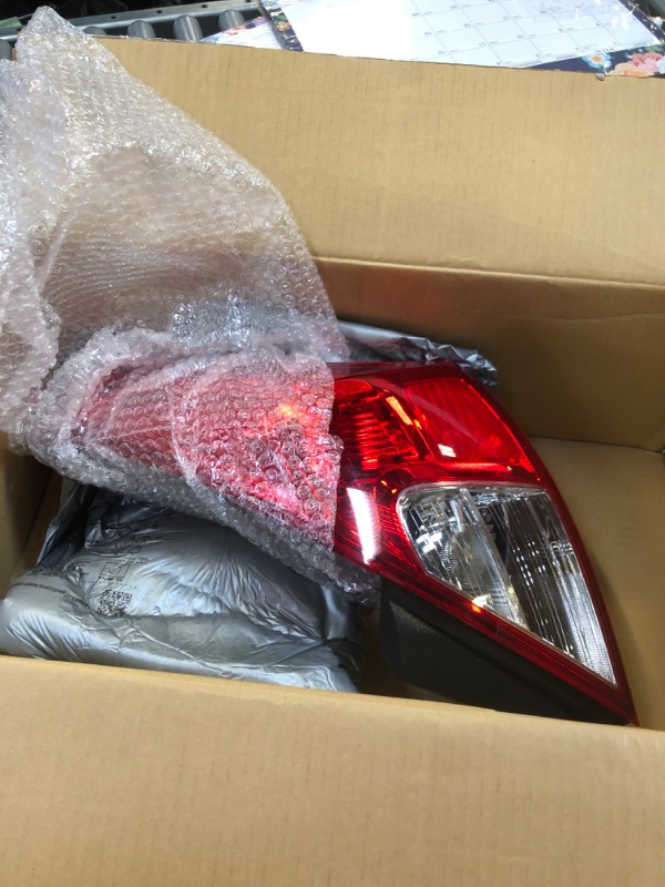 Photo 2 of Dorman 1571432 Passenger Side Tail Light Assembly Compatible with Select Nissan Models