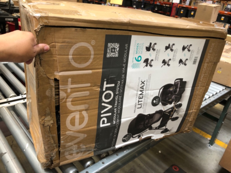 Photo 1 of Evenflo Pivot Modular Travel System with Universal Stroller Organizer Casual Gray With Universal Stroller