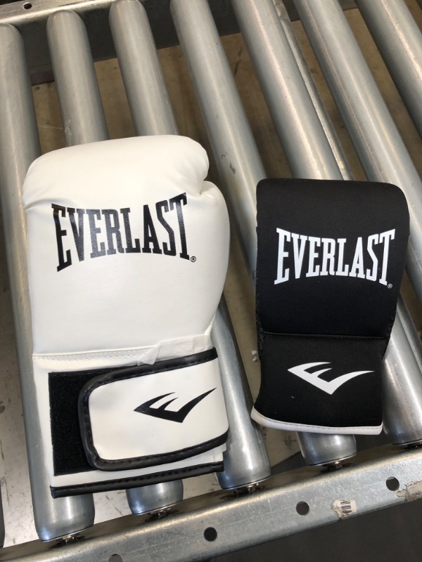 Photo 1 of EVEREST GLOVES LEFT AND RIGHT DIFFERENT SIZES