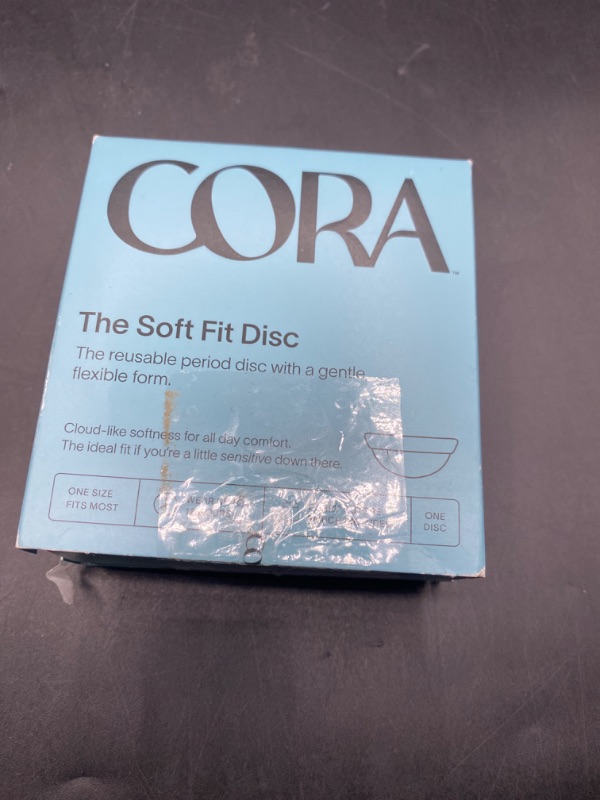 Photo 2 of The Cora Disc, now sold as the Perfect Fit Disc, was Cora’s first reusable menstrual disc and the first to offer a finger-width grip for easier removal.