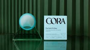 Photo 1 of The Cora Disc, now sold as the Perfect Fit Disc, was Cora’s first reusable menstrual disc and the first to offer a finger-width grip for easier removal.