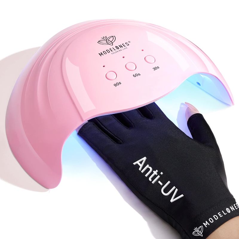 Photo 1 of Modelones Gel Nail Lamp with UV Gloves, 48W Nail Dryer with 3 Timer Settings, Nail Lamps for Gel Polish, Professional UPF99+ UV Protection Gloves for Nail...
