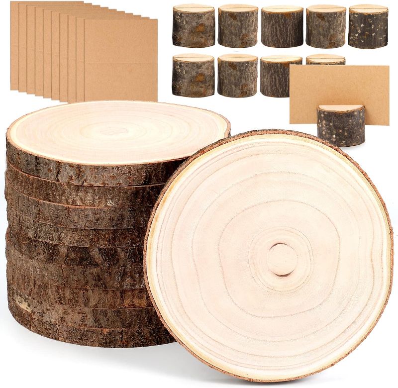 Photo 1 of Caydo 10 Piece 9-10 Inch Large Paulownia Wood Slices with 10 Piece Wood Table Number Card Holders and 10 Pieces Cards for Wedding Table Centerpiece...
