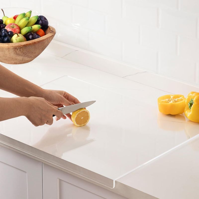 Photo 1 of Acrylic cutting board with counter lip, 24 x 18 clear cutting board for countertop, one of the game-changing kitchen essentials, the non-slip cutting boards for kitchen by Moooope (Clear, X-Large)
