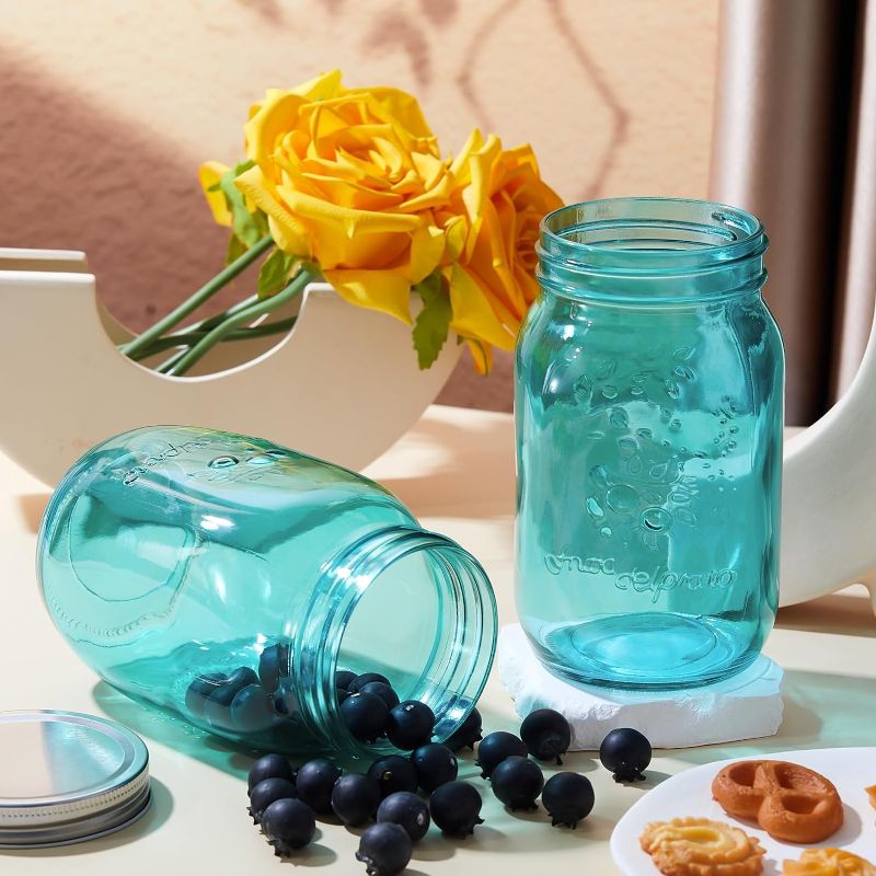 Photo 1 of Tesscos 16 oz Colored Mason Jars with Lids Glass Regular Mouth Canning Jar Pint Mason Jars NOT Allowed Dishwasher (Baby Blue)