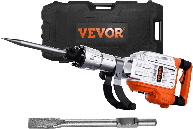 Photo 1 of VEVOR Demolition Jack Hammer, MAX 3500W Jack Hammer Concrete Breaker 1900 BPM Heavy Duty Electric Jack Hammer, 2pcs Chisel w/Gloves & 360°C Swiveling Front Handle for Trenching and Breaking Holes
