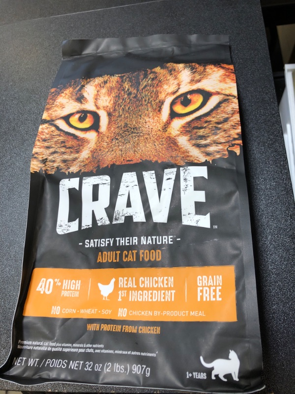 Photo 2 of Crave Cat Food, Premium Natural, with Protein from Chicken, Adult - 32 oz BEST BY 6/24/2024
