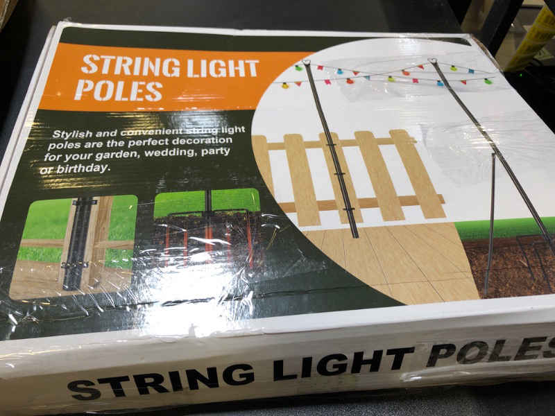 Photo 1 of STRING LIGH POLE SET (UNKNOWN MEASUREMENTS AND AMOUNT OF POLES)