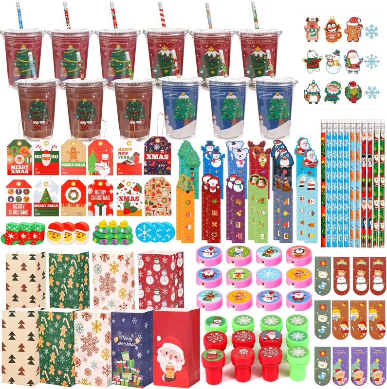 Photo 1 of Atonofun 160 Pcs Christmas Party Favors Christmas School Stationery Gift with Mini Notebook Pencils Erasers Rulers Stampers Stickers Sharpener Cups for Kids Classroom Rewards Prizes
