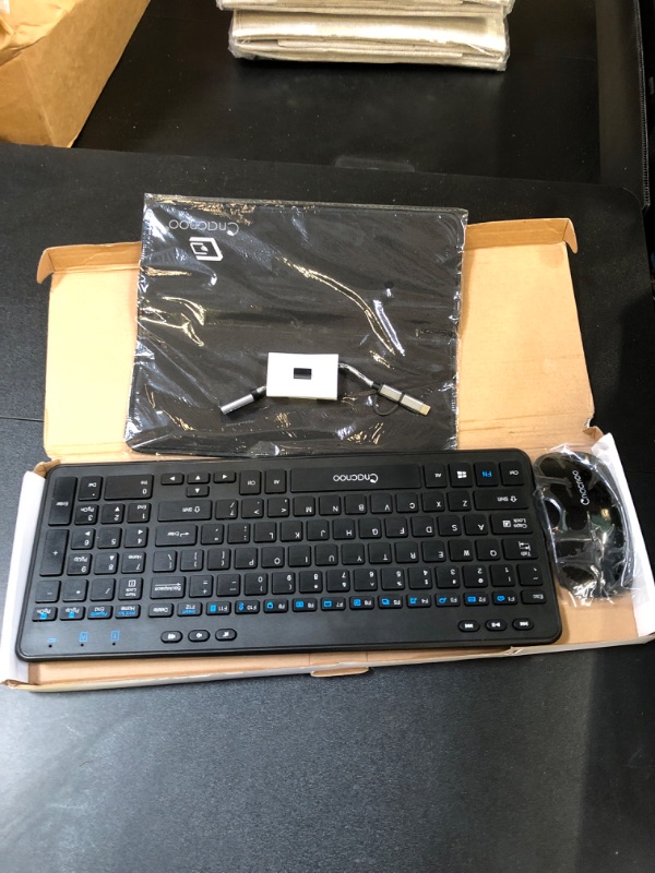 Photo 1 of KEYBOARD WITH MOUSE, CHARGER, MOUSE PAD  