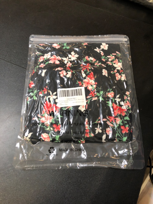 Photo 2 of WOMENS FLORAL BLOUSE
SIZE LARGE