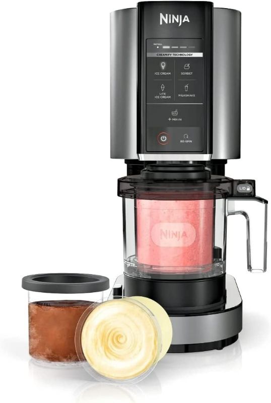 Photo 1 of Ninja NC300 CREAMi Ice Cream Maker, for Gelato, Mix-ins, Milkshakes, Sorbet, Smoothie Bowls & More, 5 One-Touch Programs, with (2) Pint Containers & Lids, Compact Size, Perfect for Kids, Silver (Renewed)
