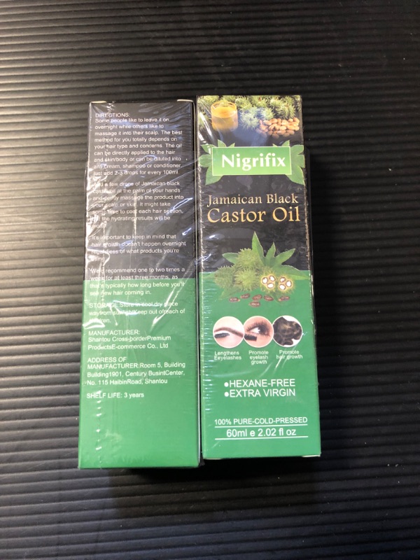 Photo 1 of 2pc Exp 10/26 nigrifix castor oil