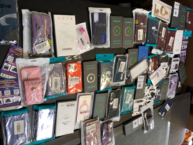 Photo 1 of PHONE CASE MYSTERY BAG LOT SOLD AS IS NO RETURNS OR EXCHANGES STYLE COLOR AND SIZE DOES VARY PINK BLACK CLEAE GOLD ETC : 