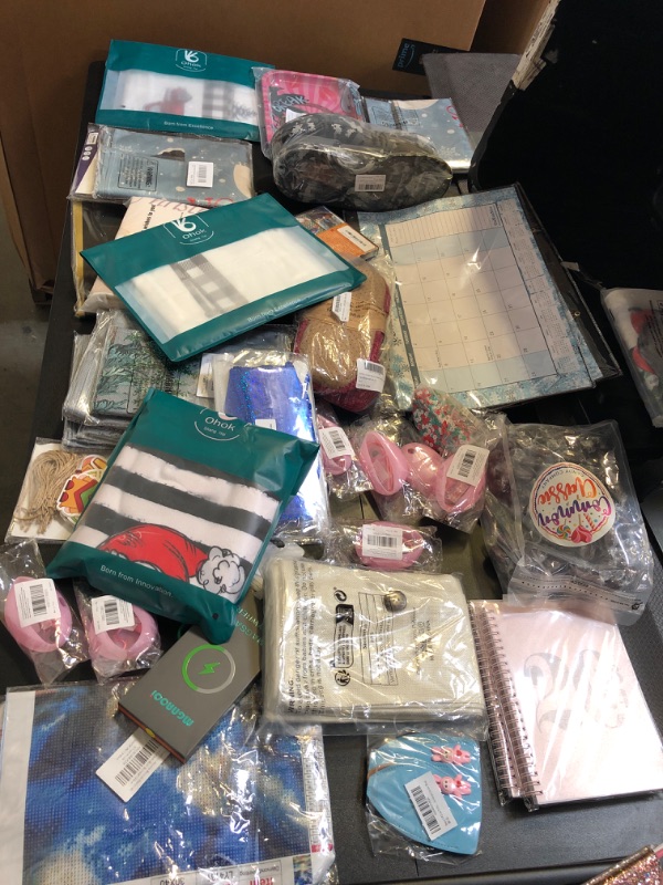 Photo 1 of MYSTERY BOX LOT FILLED WITH MIXED ITEMS SOLD AS IS NO RETURNS OR EXCHANGES ON ANY ITEM INCLUDES BUT NOT LIMITED TOO PINK , 2024 CALANDERS , CINCO DE MAYO DECOR , ROLLING Tray , house slippers , pillow covers etc : 