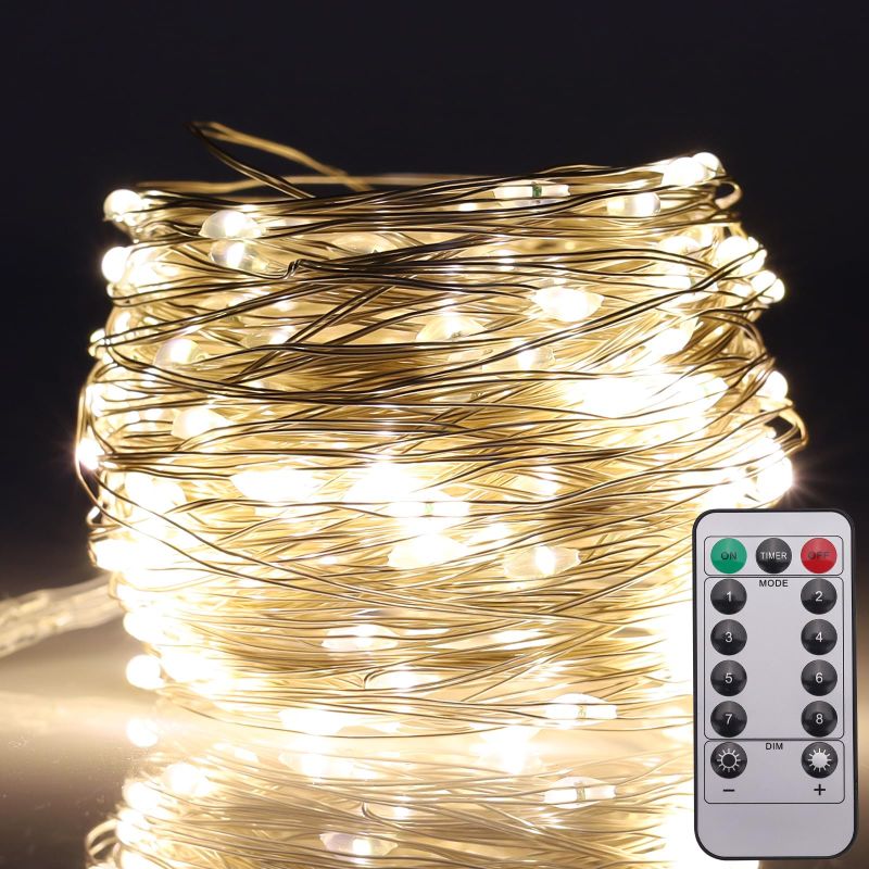 Photo 2 of Warm White LED Fairy Lights, 33FT 100 LED Battery Powered String Lights with Remote, 8 Modes for Outdoor Indoor Decor