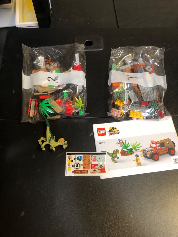 Photo 3 of LEGO Jurassic Park Dilophosaurus Ambush 76958 Building Toy Set for Jurassic Park 30th Anniversary, Dinosaur Toy with Dino Figure and Jeep Car Toy; Gift Idea for Grandchildren and Kids Ages 6 and Up Multicolor