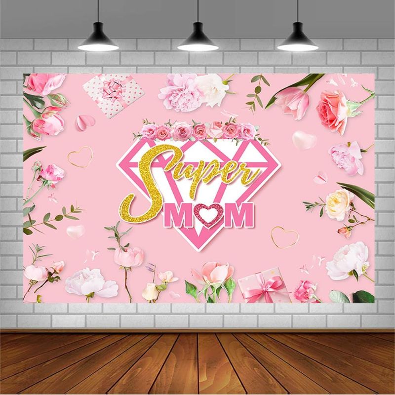Photo 1 of 7x5ft Happy Mother's Day Backdrop Super Mom I Love You Mom Mother Day Party Decorations Blush Pink Floral Gifts Photography Background for Women Thanks Mother's Day Banner Photo Booth Props
