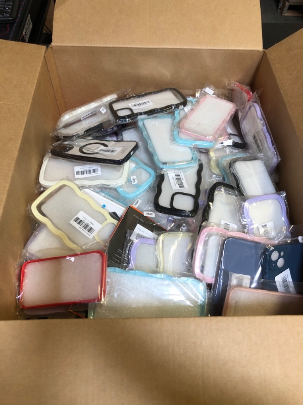 Photo 1 of MISC PHONE CASES  BOX LOT ITEMS  (NEW, SOLD AS IS!)